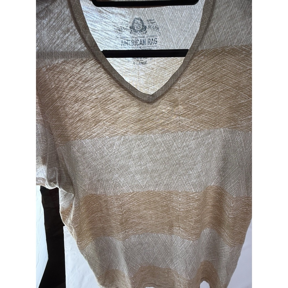 American Rag CIE men's short sleeve V-neck shirt in size XL.